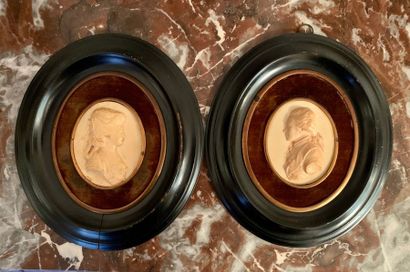 Pair of oval medallions in plaster with a...
