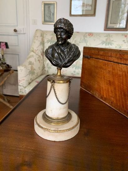 Bust of Rousseau with fur cap, in patinated...