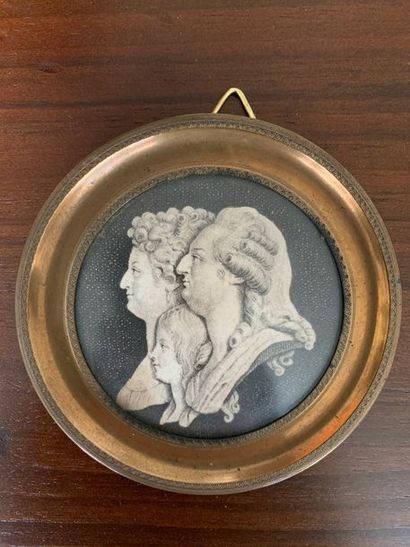 Round miniature printed in black representing...