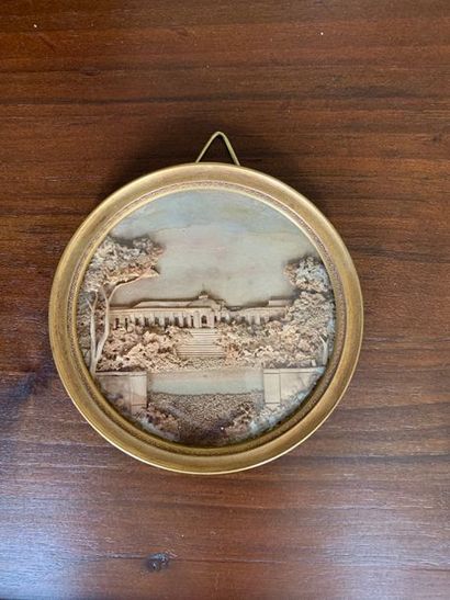 Round miniature in cut cork and sand on a...
