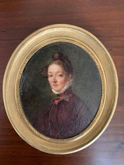 Oval miniature on metal representing a portrait...