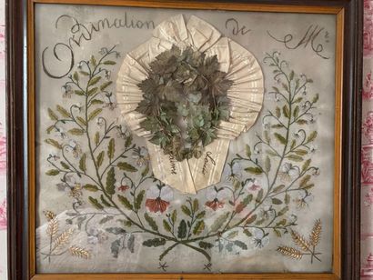 Embroidery composed of an armband surrounding...