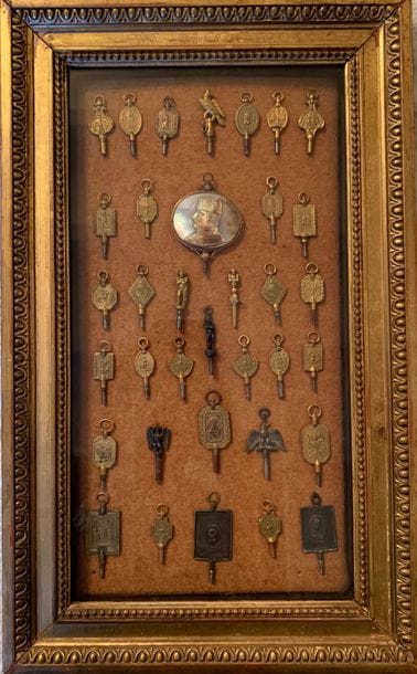 Collection of thirty-five watch keys on the...