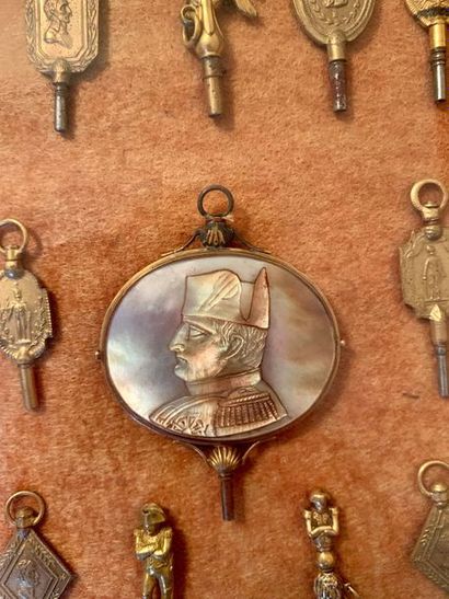 Collection of thirty-five watch keys on the...