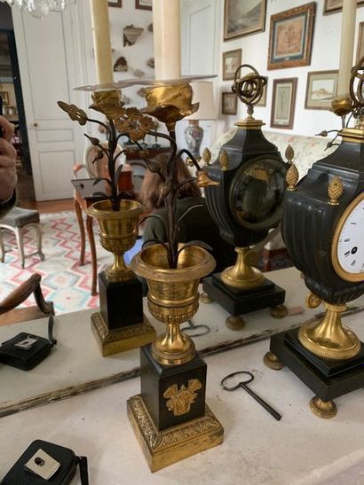 Pair of gilt and patinated bronze torches...