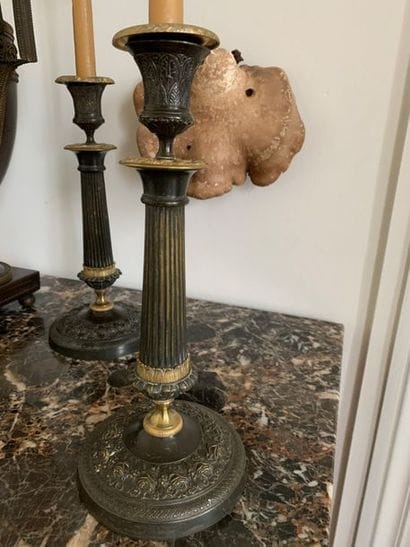 Suite of four torches in patinated and gilded...