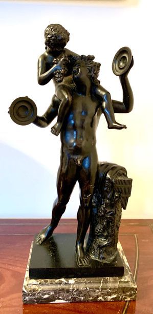 Statuette in patinated bronze representing...