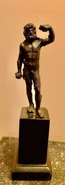 Cast bronze statuette with patina representing...