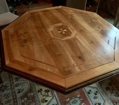 Table, the octagonal top in walnut inlaid...