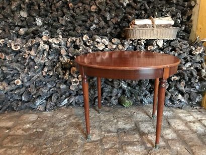 Small mahogany coffee table, oval top on...