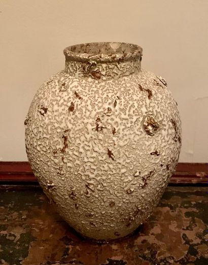 Glazed ceramic ovoid vase. Decoration of...