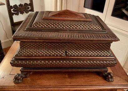 Large walnut chest with gilded fillets. Carved...