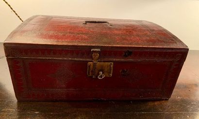 Box with slightly domed lid, lined with embossed...