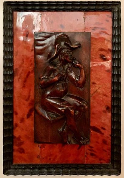 Small softwood panel carved in bas-relief...