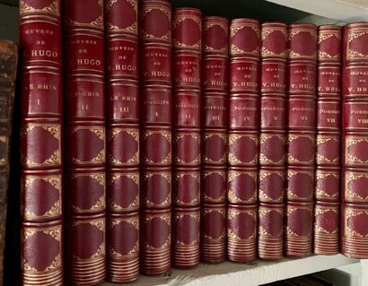 Series of volumes, half-binding in red morocco...