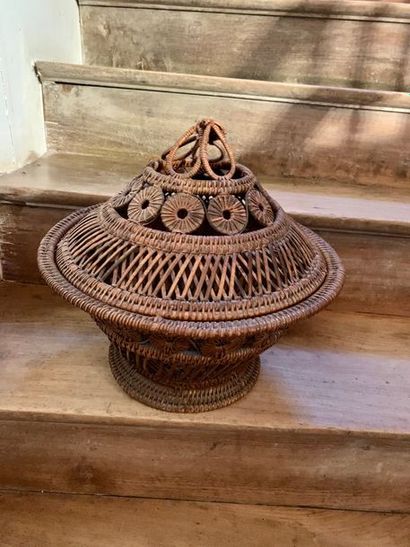 Set of three baskets decorated with rosettes...