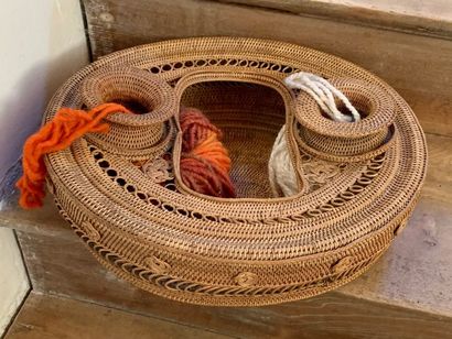 Set of three baskets decorated with rosettes...