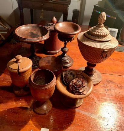 Set of nine turned wood pieces: covered cuts...