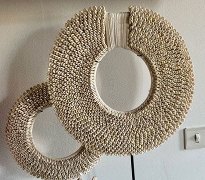 Two shell pectorals from Nassa, Tolai tribe.
Papua...