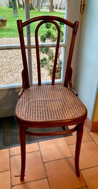Suite of four bentwood chairs, cane seat.
Work...
