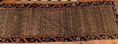 Woolen oriental gallery carpet decorated...
