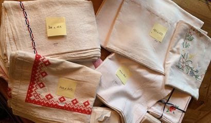 Set of nine embroidered or openwork tablecloths.
240...