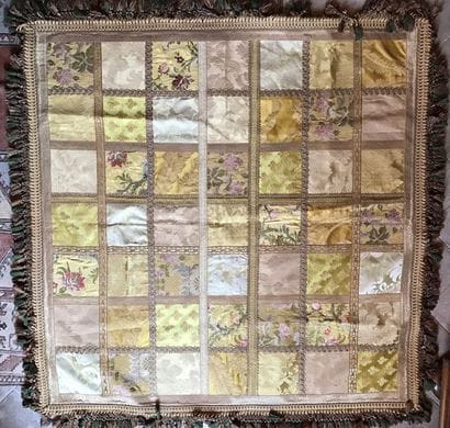 Tablecloth composed of forty-nine squares...