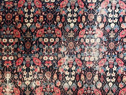 Carpet with stylised floral decoration on...