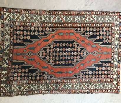 Wool oriental rug, the central lozenge with...