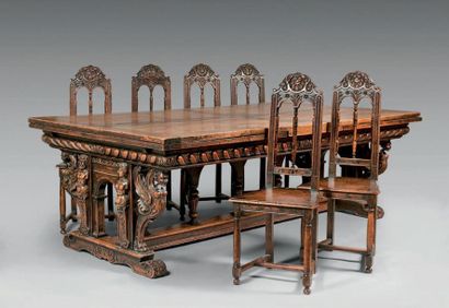 An important walnut table, the parquet flooring...
