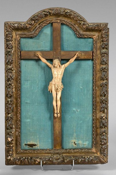 Carved ivory Christ in a gilded wood frame...