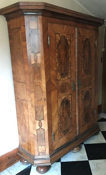 Veneer cabinet of various fruit woods inlaid...