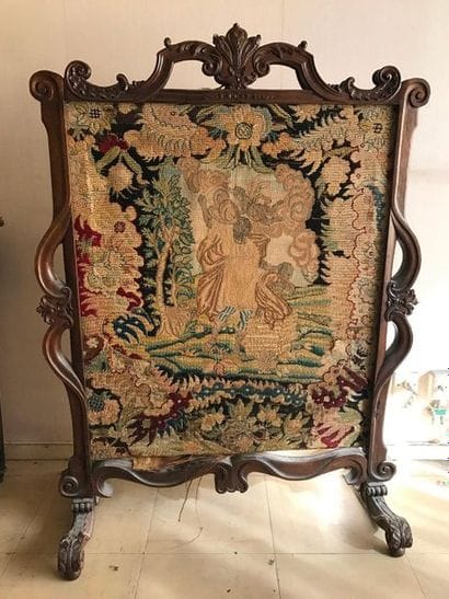 Moulded and carved fruitwood screen with...
