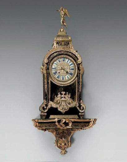 Cartel and its cul-de-lampe in brass marquetry...