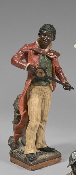 Dans le goût de GOLDSCHEIDER:
JOUEUR DE BANJO.Sculpture...