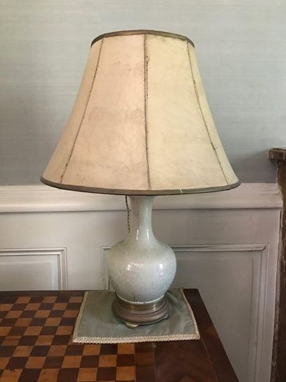 Old oil lamp in celadon porcelain with baluster...