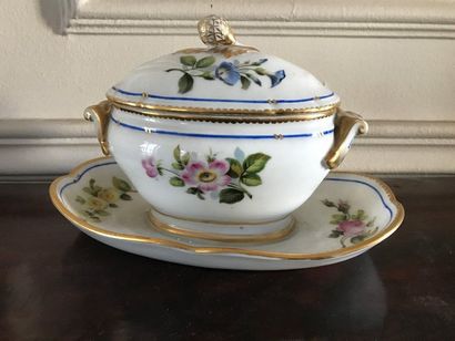 Covered gravy boat on its porcelain frame,...