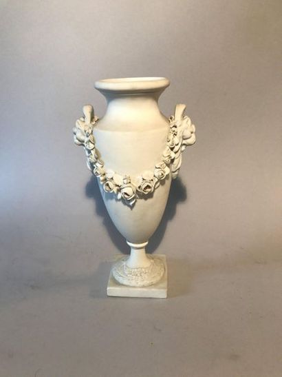 Vase in the shape of a bisque baluster, the...