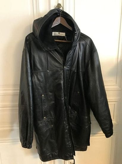 Pierre BALMAIN. 
Hooded black leather caban,...