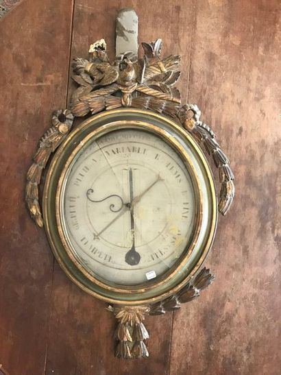 Barometer made of wood with green and golden...