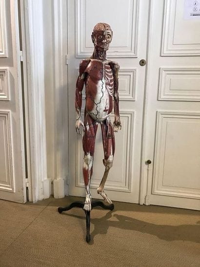 Flayed on a cast iron tripod stand from the...