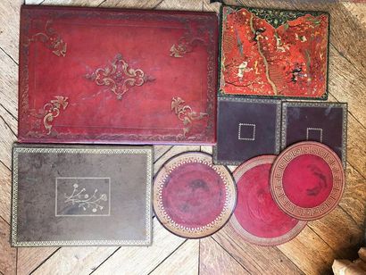 Set of desk pads, one in embossed red morocco,...