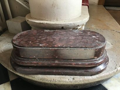 An oblong shaped clock base in griotte marble...