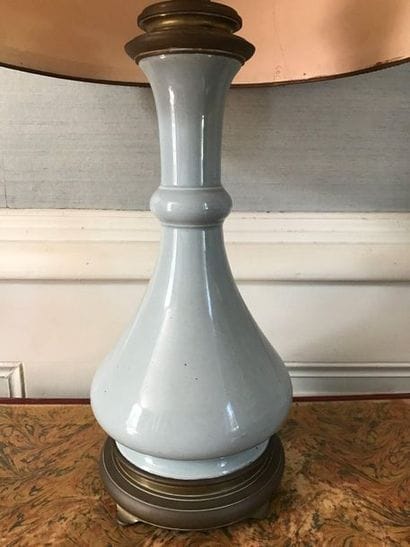 Old oil lamp in cracked celadon ceramic,...