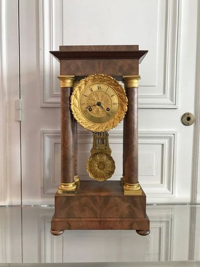 Mahogany and mahogany veneer portal clock....