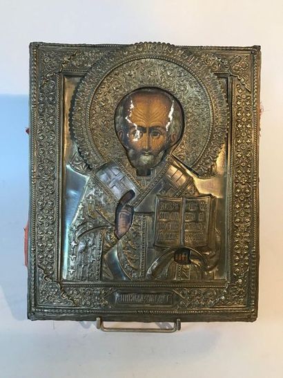 Icon representing a saint blessing and holding...