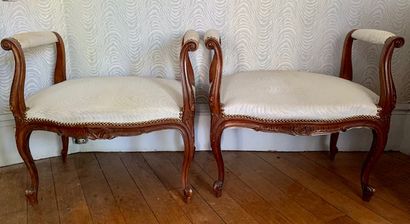 Pair of small benches in natural wood molded...