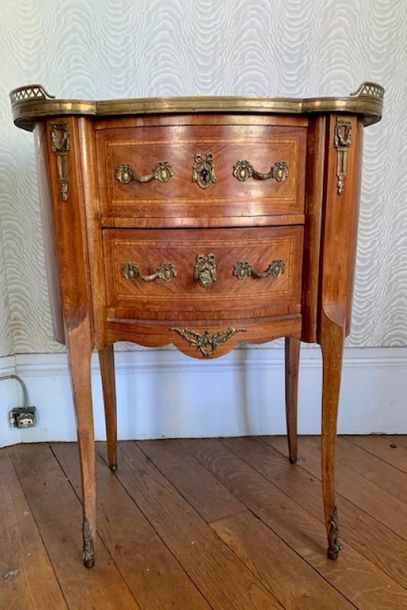 Small kidney shaped veneer table with two...