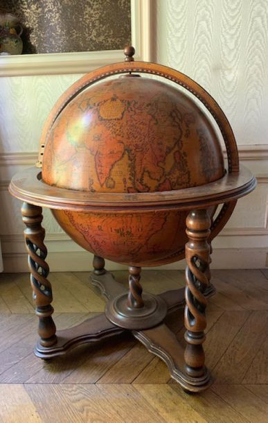 A world map forming a liquor cellar, the...