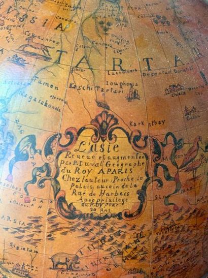 A world map forming a liquor cellar, the...